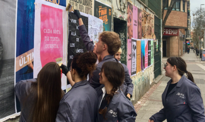 Ecodiseño y cartelería en el IED Madrid: los estudiantes de Diseño Gráfico sacan sus creaciones a las calles de Carabanchel